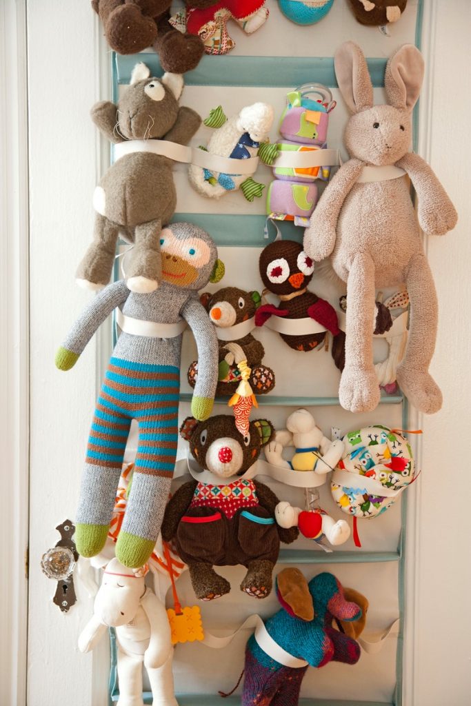 Hang a toy organizer on the door