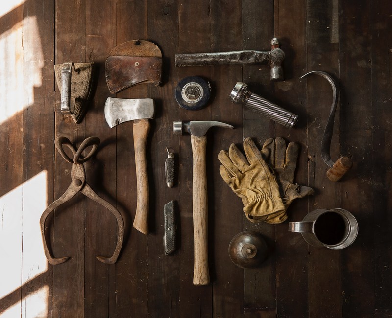 random home  tools on wooden board