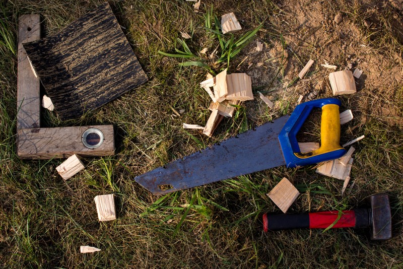 cutting wood with hand saw