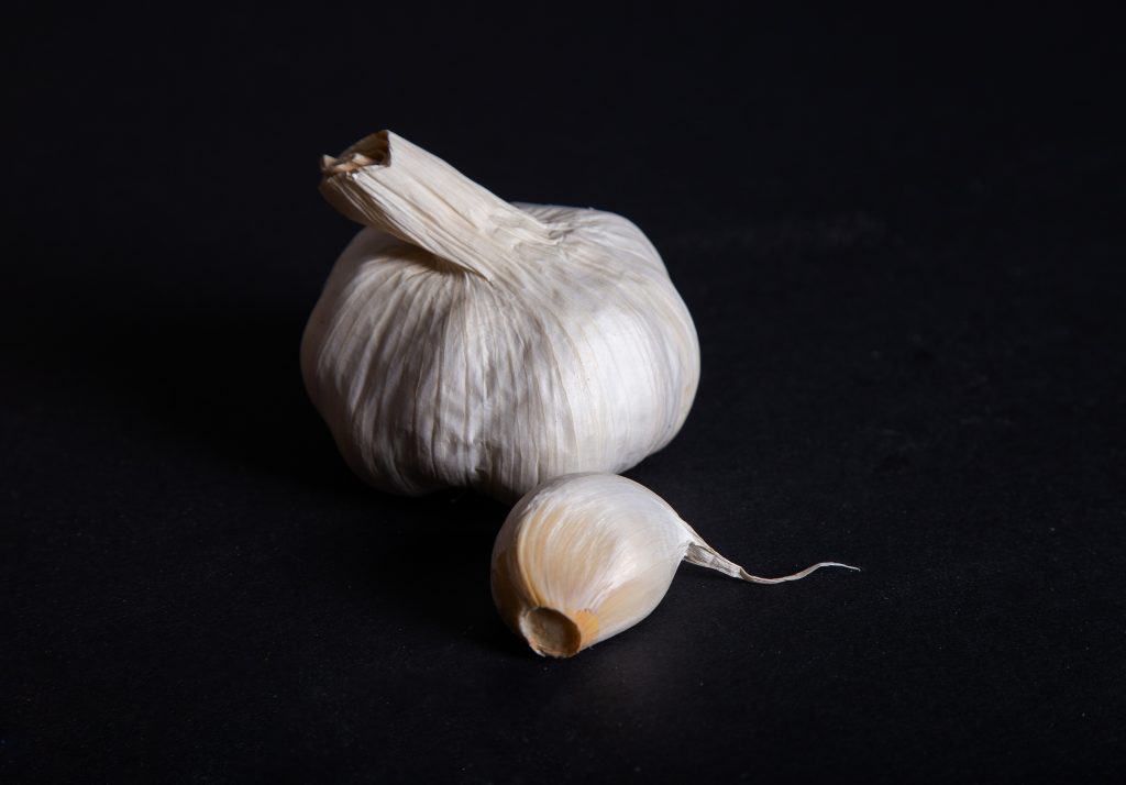 garlic on black background 