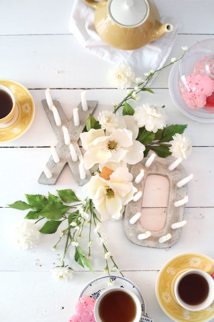 Letter shaped candle holders for the dinner table