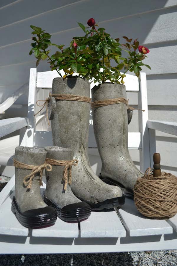 Concrete flower pots from old boots